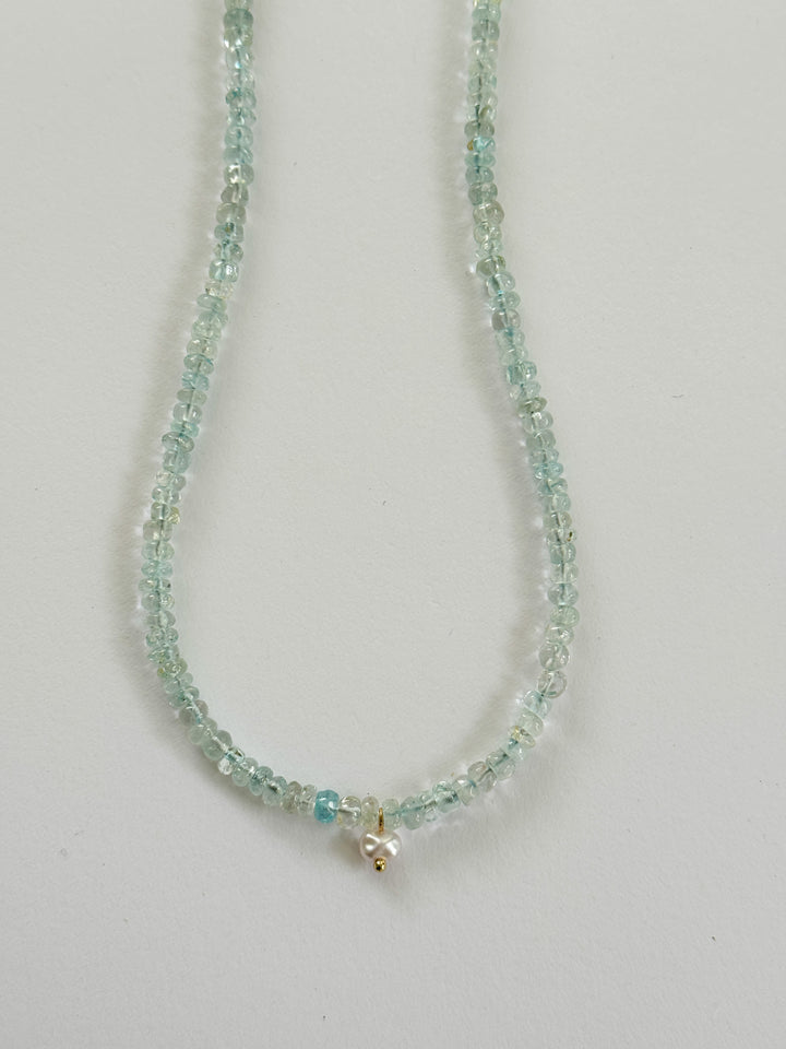 Necklace with small aquamarine beads with a small pearl charm