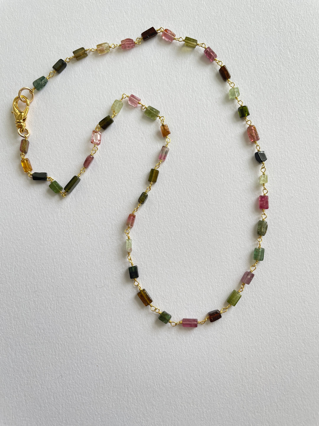 Rectangle tourmaline stones in a rosary style chain with lobster clasp
