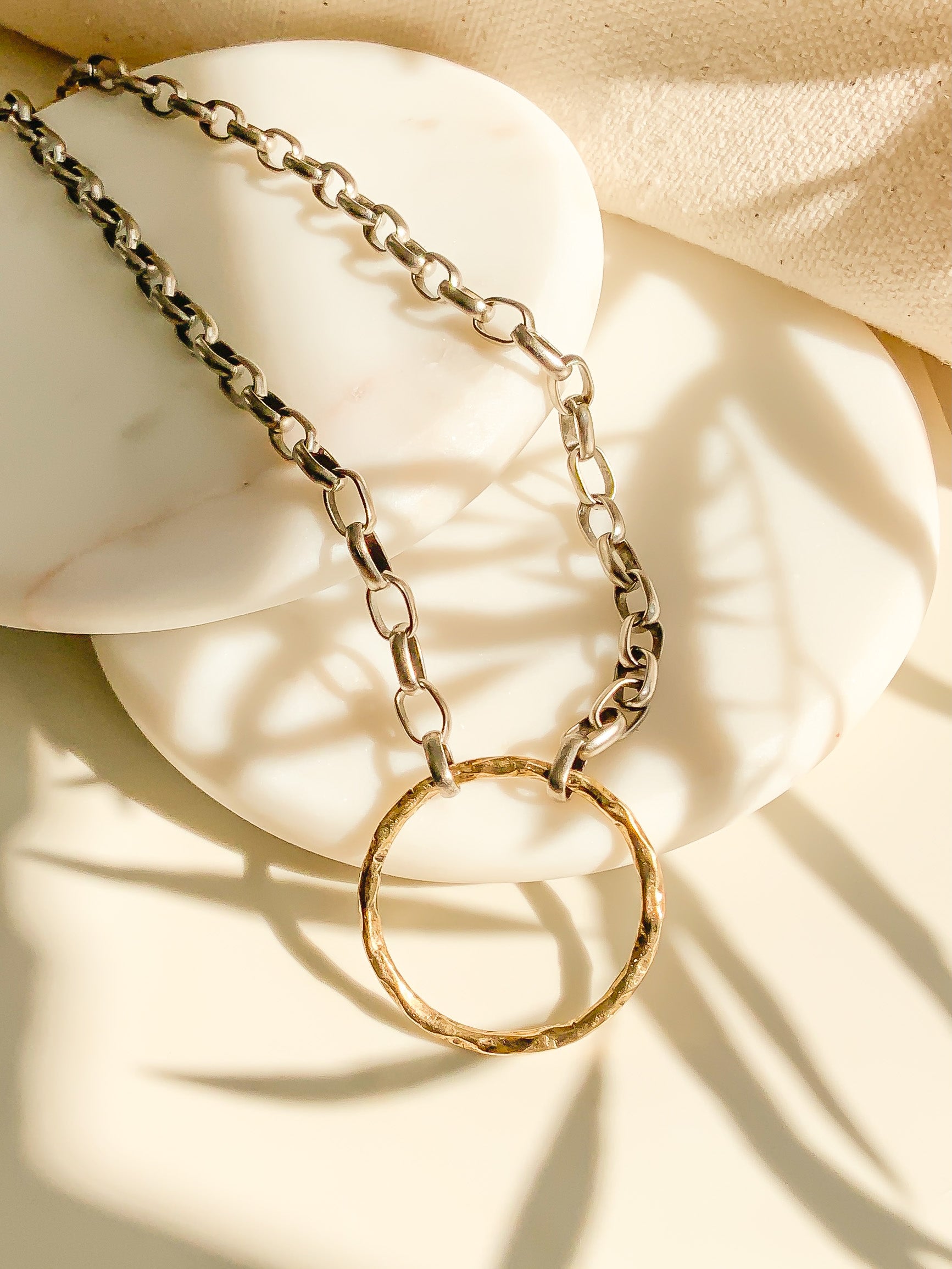 Infinity gold and silver necklace